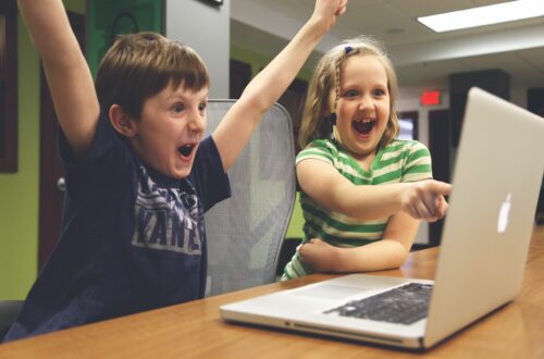 Excited Kids With Laptop Free Stock Picture