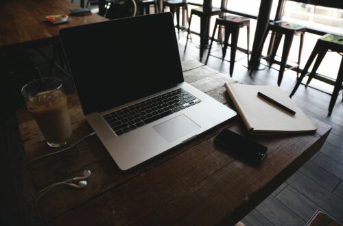 Laptop, Headphones, Notebook, Cell Phone, and Coffee Free Stock Picture