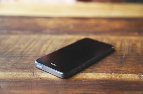 Cell Phone On Desk Free Stock Picture