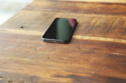 Cell Phone On Desk Free Stock Picture