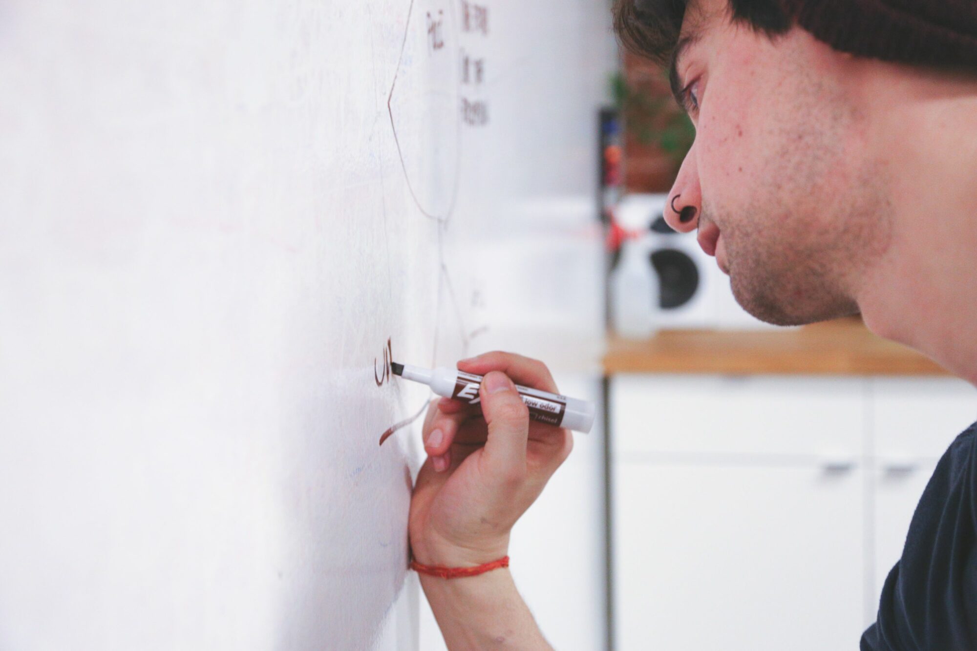 Man Writing On Whiteboard Free Stock Picture